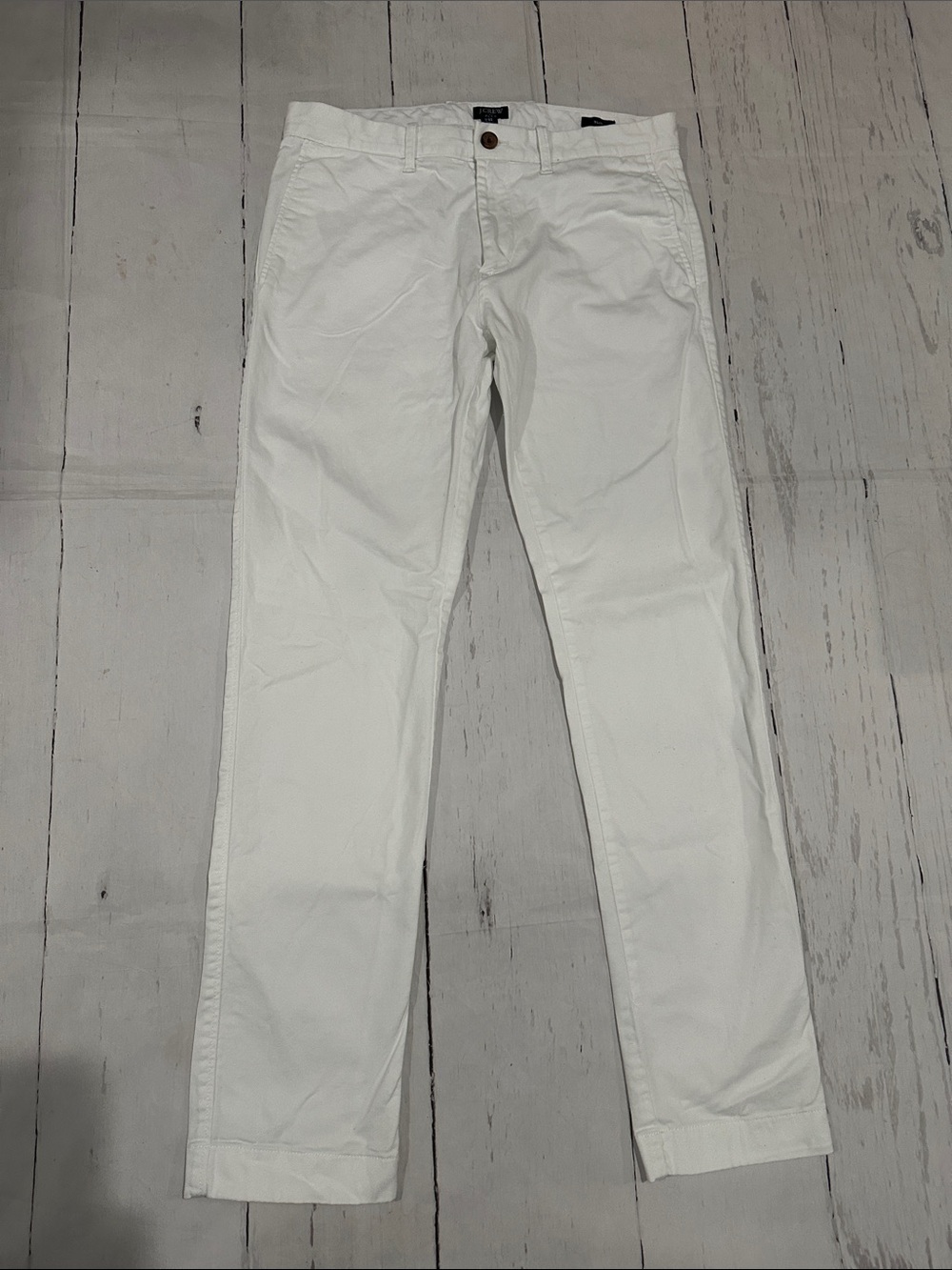 J. Crew Factory 
White slim Chino Pants 30 x 32 
EUC